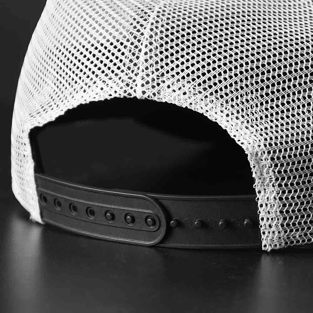 The snapback closure of the Death Wish Coffee Rebellious By Nature Trucker Hat.