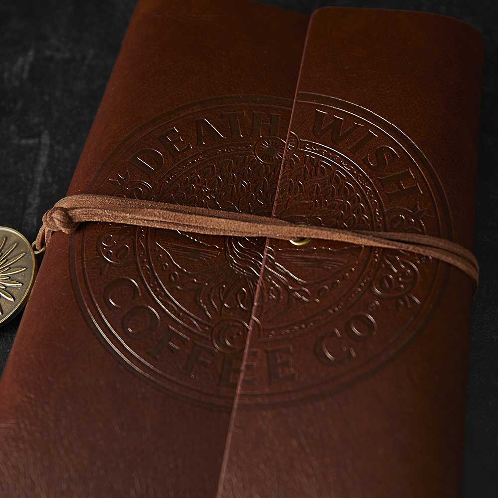 A close up of the front of the Death Wish Coffee Tree of Life Journal.