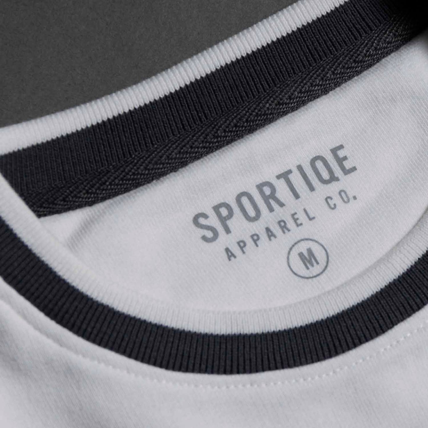 A detail shot of the inner neck label of the Death Wish Coffee Brews Cruise Pullover.
