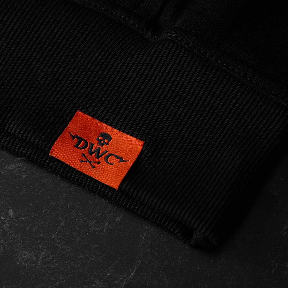 The woven tag on the Death Wish Coffee Varsity Brews Hoodie.