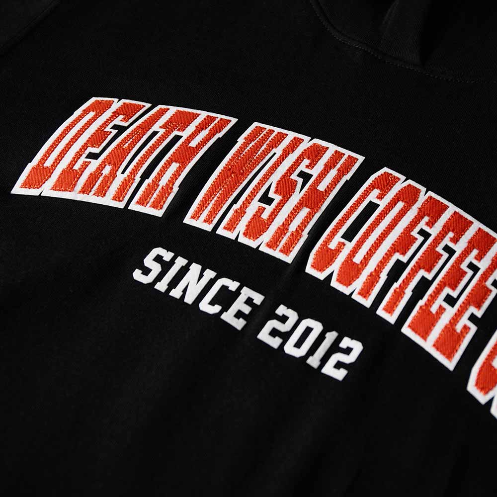 A close up of the Death Wish Coffee Varsity Brews Hoodie.