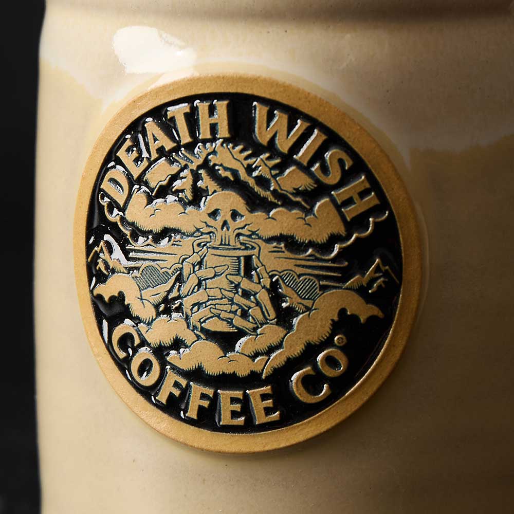 A close up of the Death Wish Coffee Shrouded Mountain Mug.