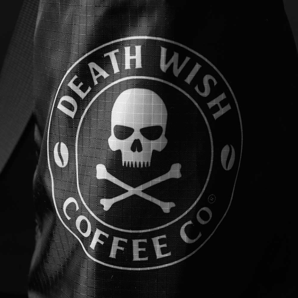 A close up of the front of the Death Wish Coffee Sunrise Summit Sling.