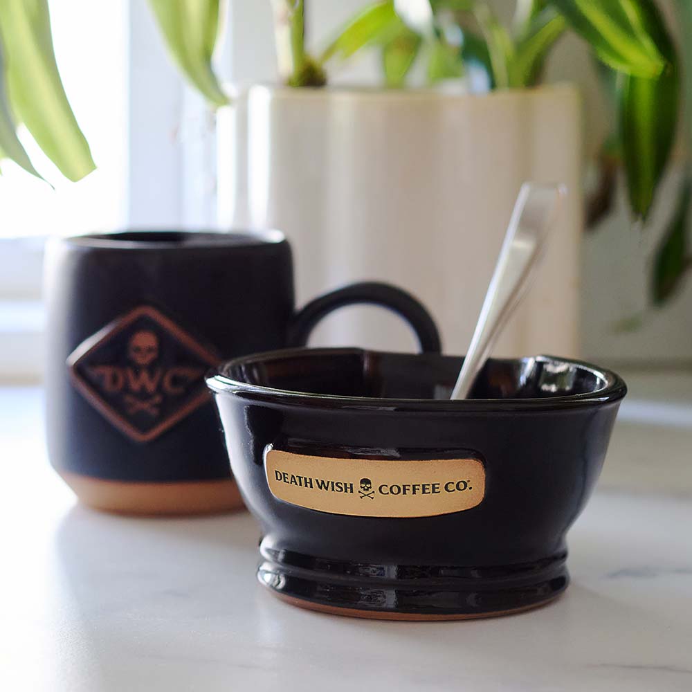 A spoon resting on the Death Wish Coffee Spoon Rest For The Wicked.