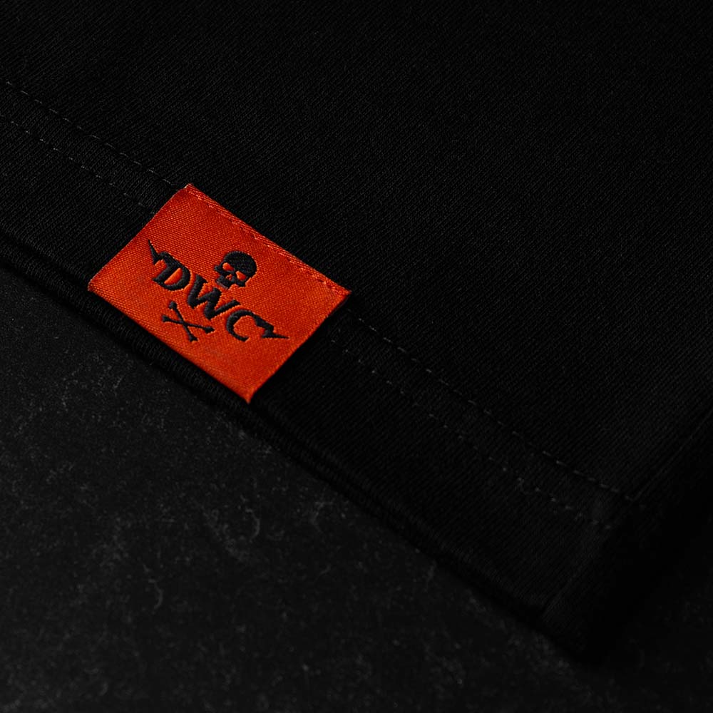 The woven tag on the Death Wish Coffee Varsity Brews Tee.