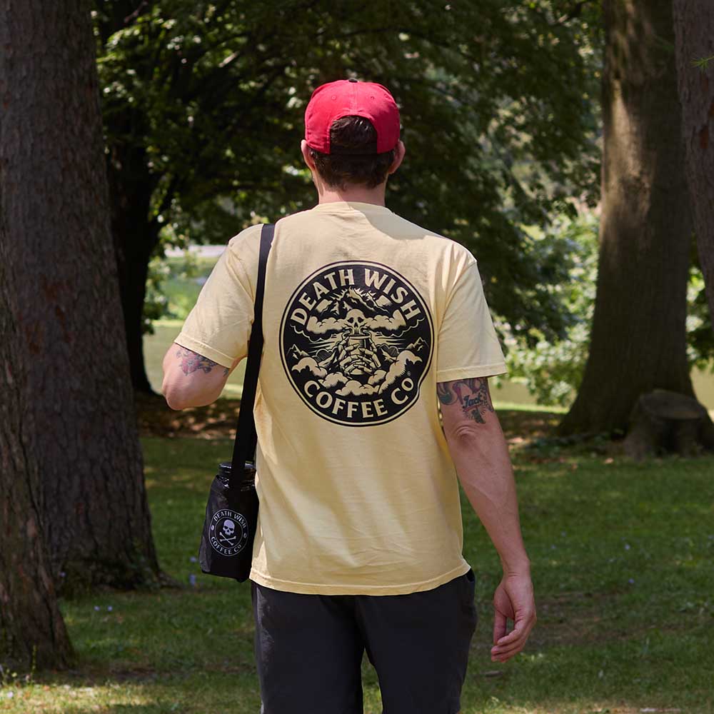 Wearing the Death Wish Coffee Higher Ground Tee.