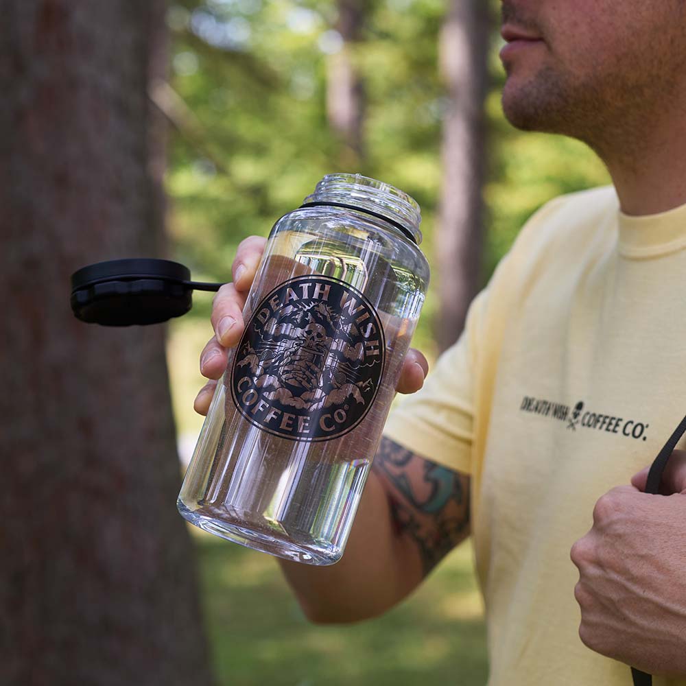 Drinking from the Death Wish Coffee Higher Ground Water Bottle.