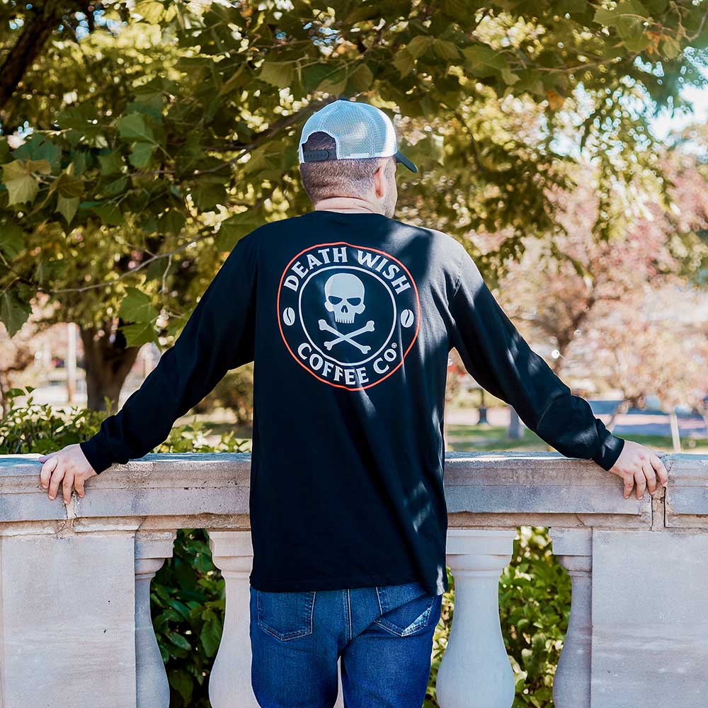 A model wearing the Death Wish Coffee Nothing to Hide Pocket Tee.