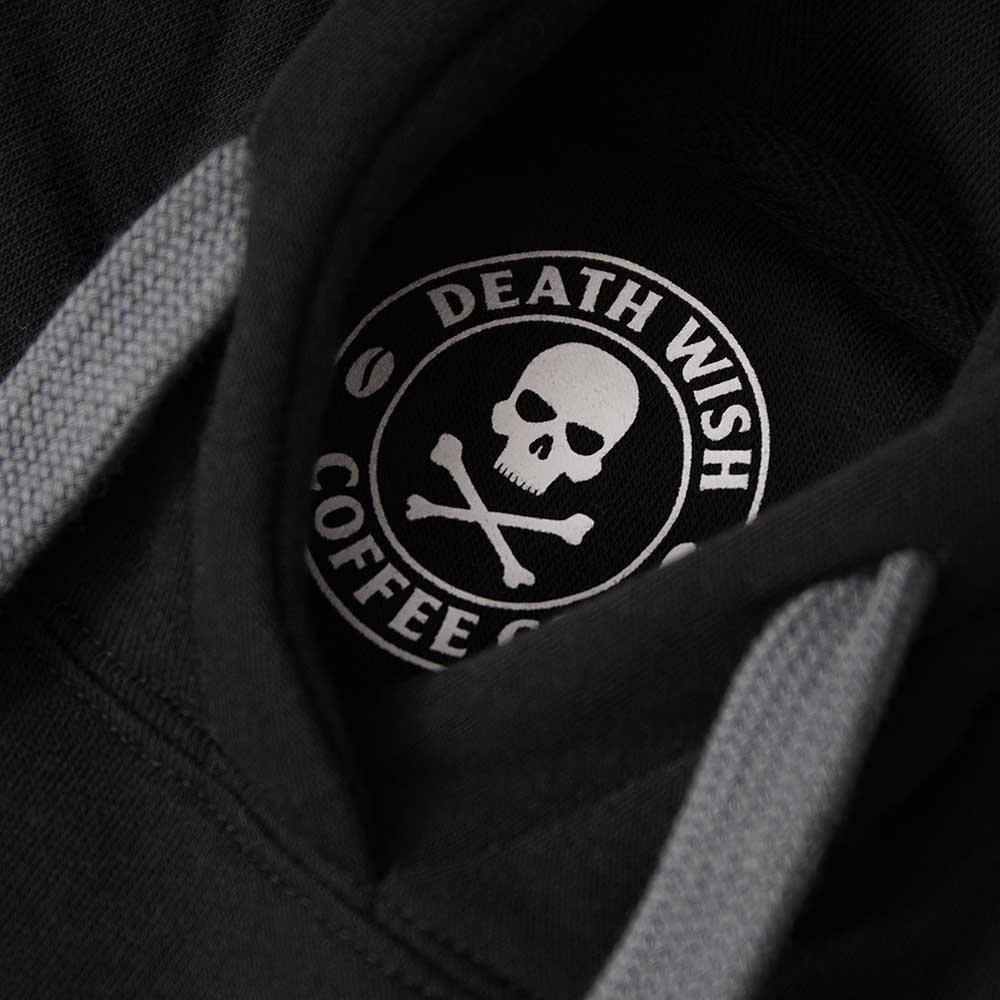 The inner neck label of the Death Wish Coffee Signature Shadow Hoodie.