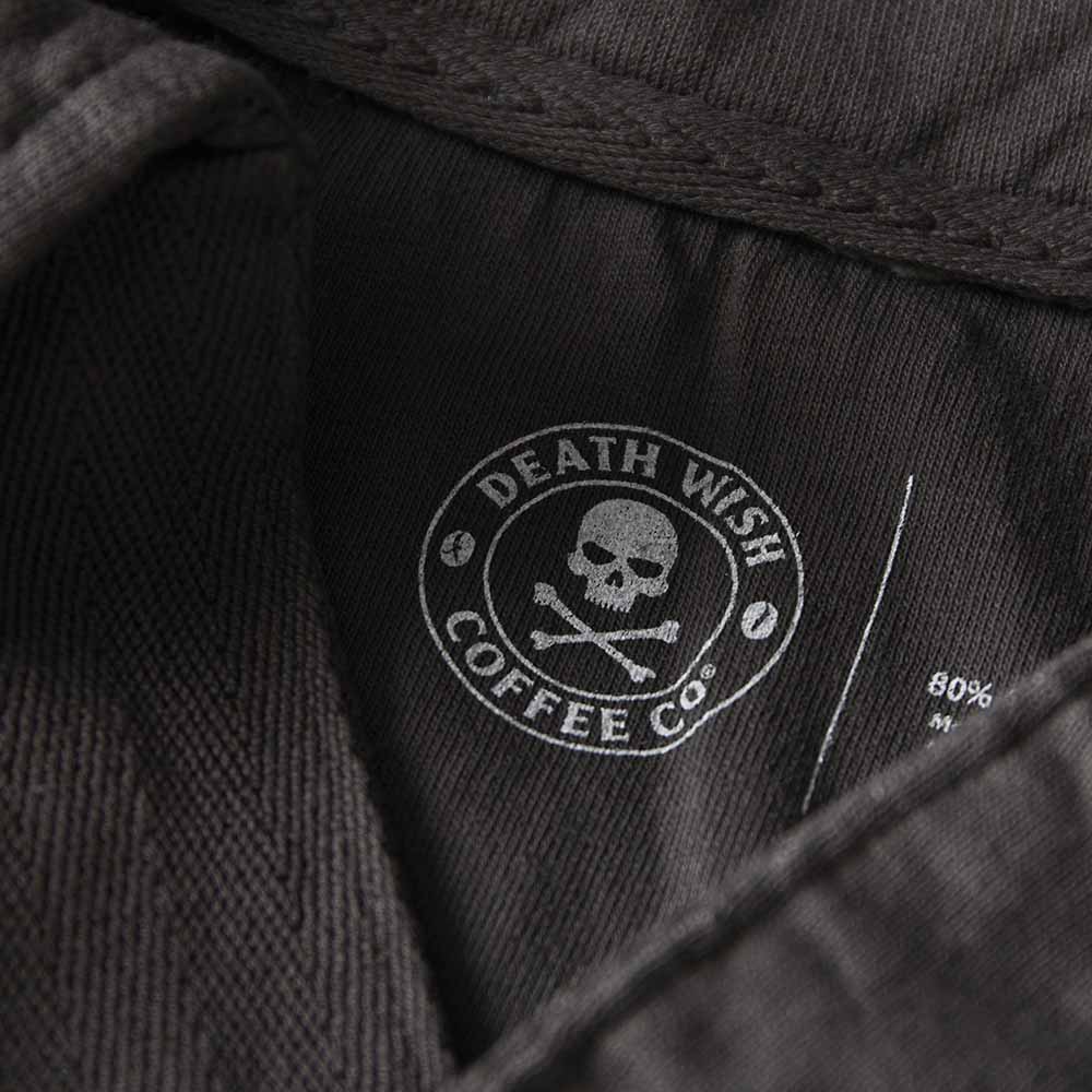 The inner neck detail of the Death Wish Coffee Collar Me Caffeinated Polo.