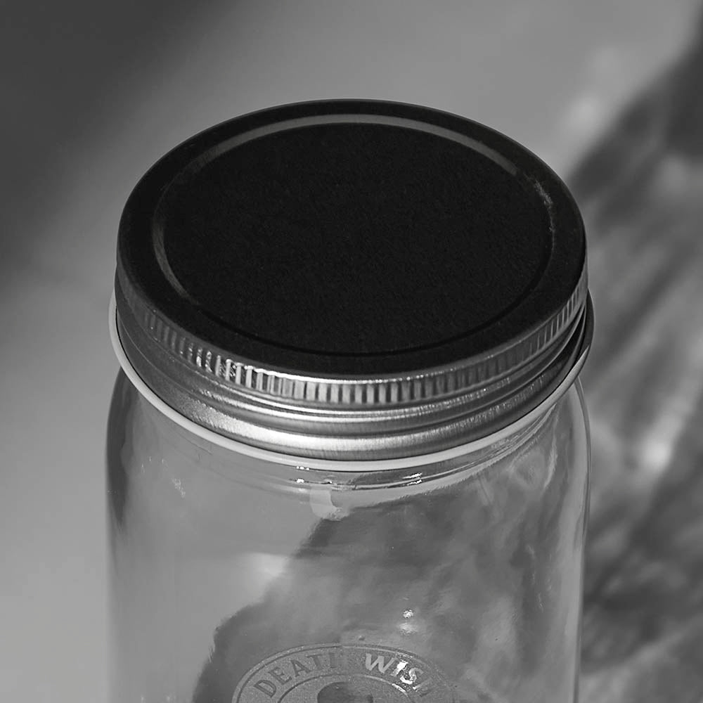 The lid of the Death Wish Coffee Coal Brew Mason Jar Set.