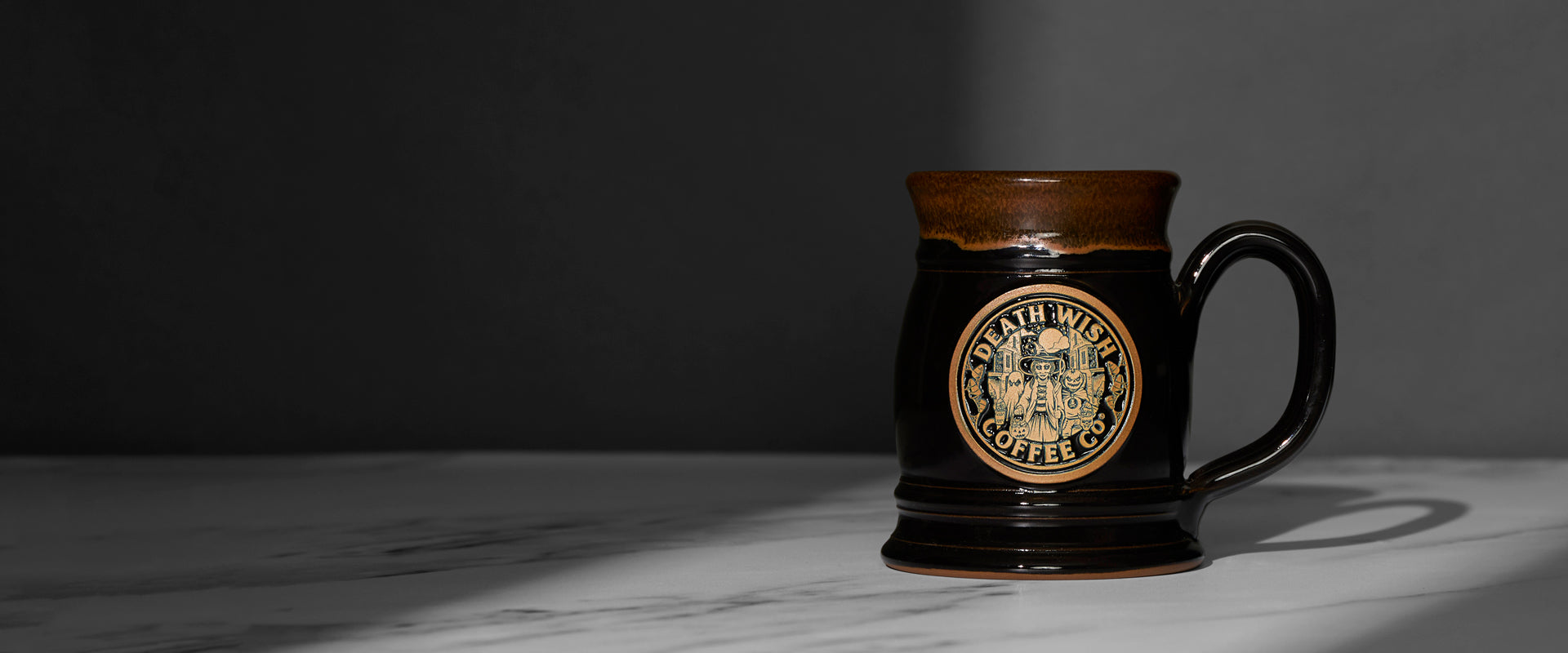 Shop the Death Wish Coffee Trick or Treat Tankard and matching merch.