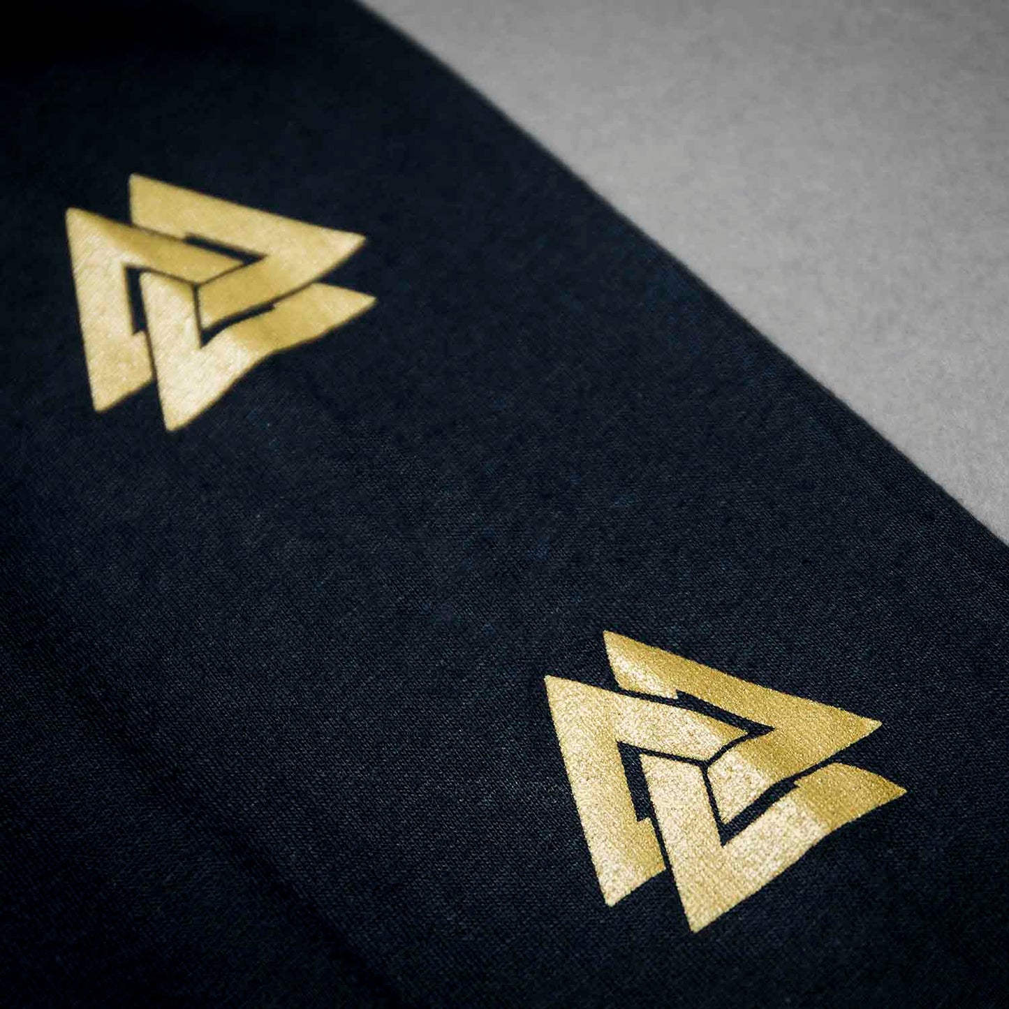 A detail shot of the sleeve of the Death Wish Coffee Gates of Valhalla Long Sleeve.