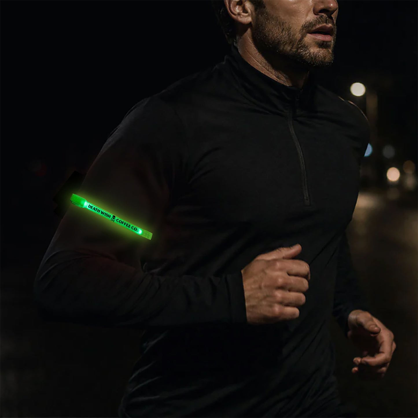 A model wearing the Midnight Marker LED Arm Band while running at night.