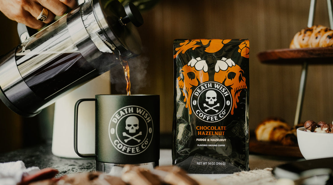 Pouring Chocolate Hazelnut flavored Death Wish Coffee into a coffee mug.