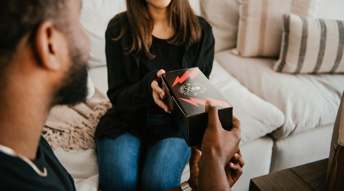 A mom receiving the Death Wish Coffee Rad Mom Kit as a gift.