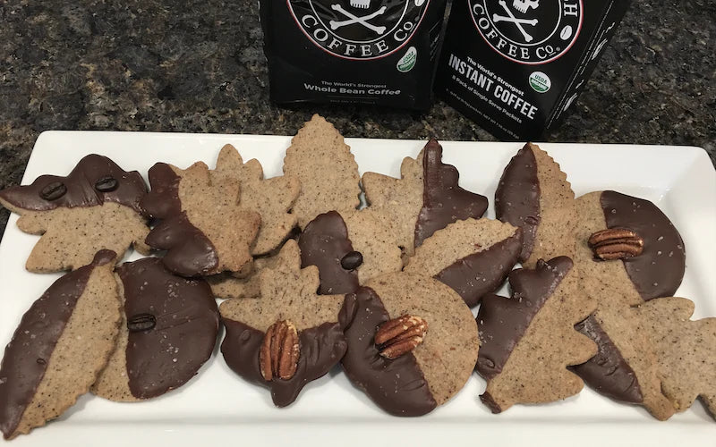 Leaf shaped espresso shortbread cookies made with Death Wish Coffee on a white platter 