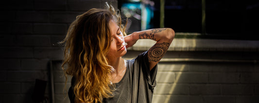 A young female experiencing a caffeine crash. Photo Credit: Keenan Constance via Unsplash.
