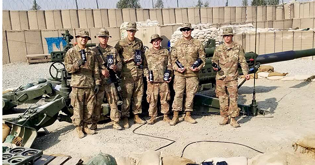 U.S. soldiers in Afghanistan holding bags of Death Wish coffee