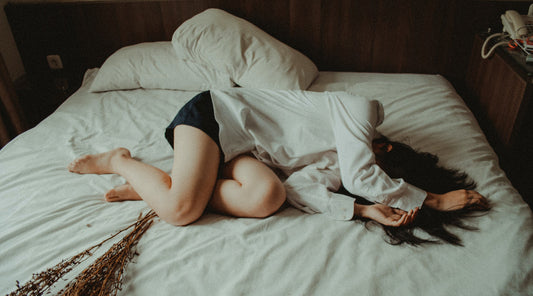 A woman taking a nap after drinking coffee.