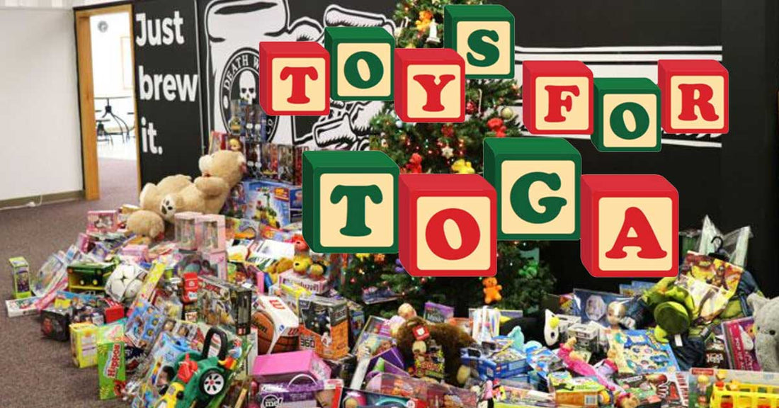 Toys under a Christmas tree with Toys for Toga logo overlay