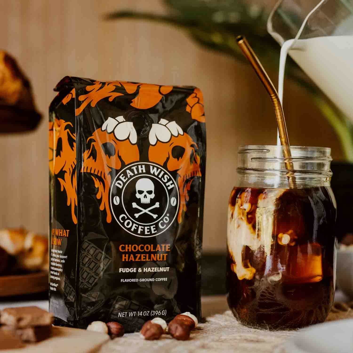 Pouring creamer into Chocolate Hazelnut Death Wish Coffee.