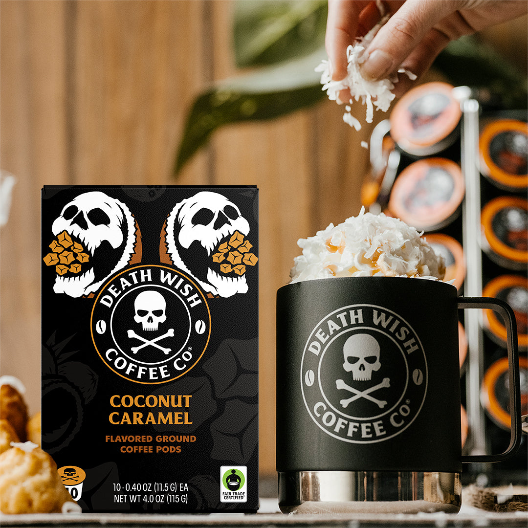 Putting a fresh coconut garnish onto Coconut Caramel flavored Death Wish Coffee.