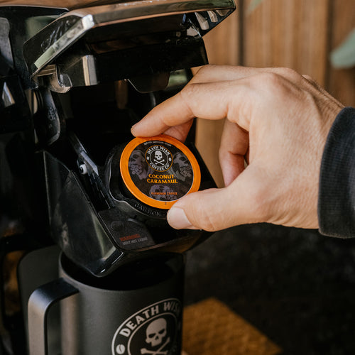 Brewing a cup of Death Wish Coffee Coconut Caramaul Flavored Coffee using single-serve pods.