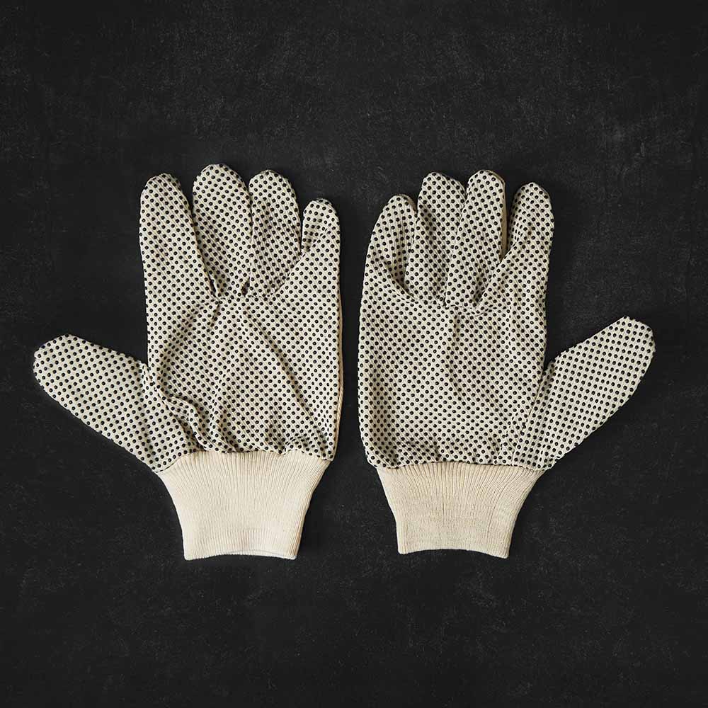 The palm side of the Death Wish Coffee Gettin' Dirty Gardening Gloves.