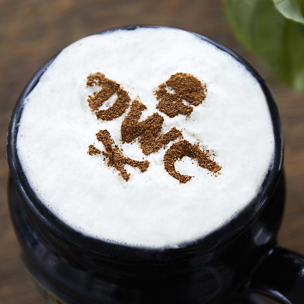 A latte made using the stencil from the Let It Fly Latte Pen & Stencil Set.
