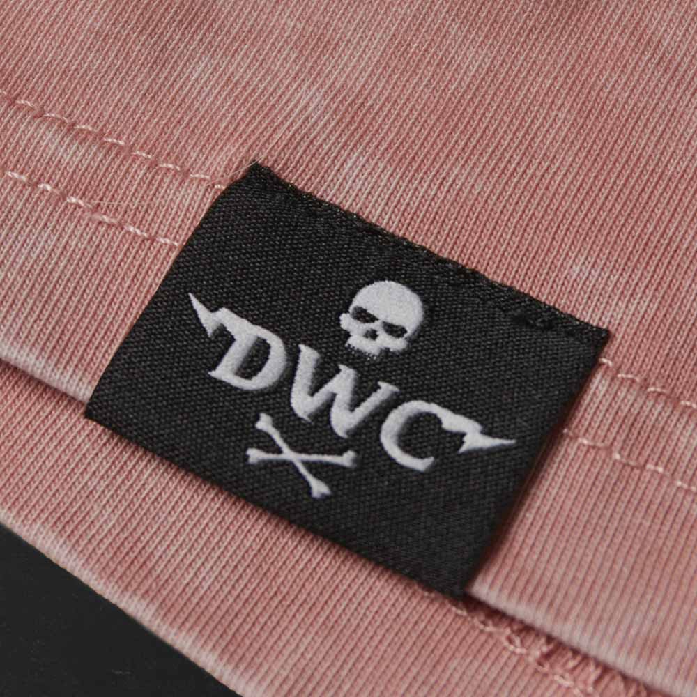 The woven label on the hem of the Death Wish Coffee Pink Haze Tee.