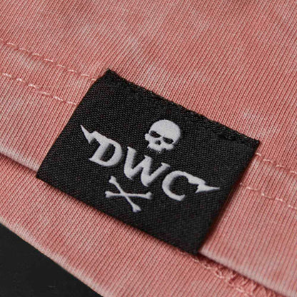 The woven label on the hem of the Death Wish Coffee Pink Haze Tee.