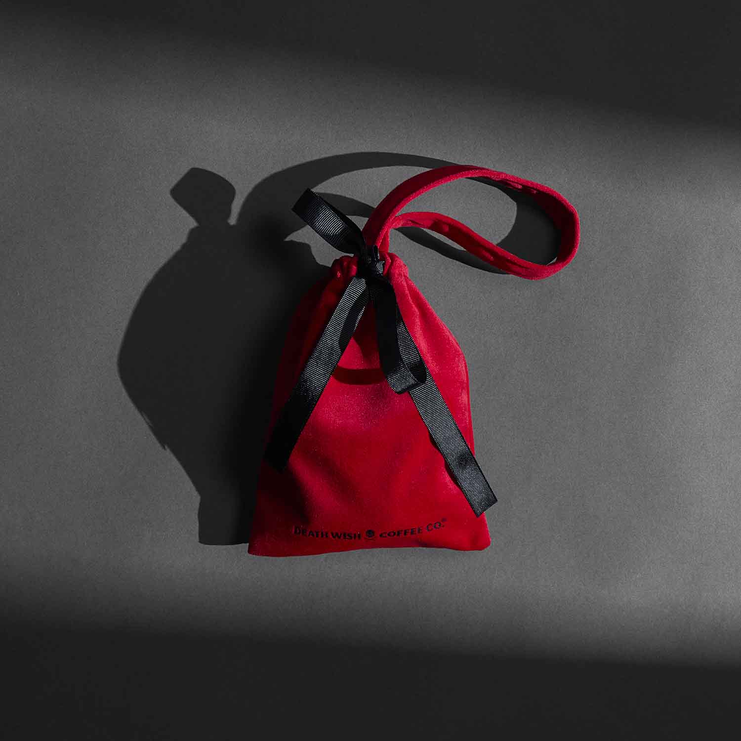 The red velvet bag from the Death Wish Coffee Ready, Set, Relax Bath Bundle.