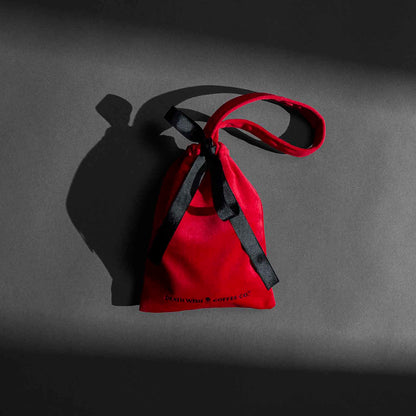 The red velvet bag from the Death Wish Coffee Ready, Set, Relax Bath Bundle.