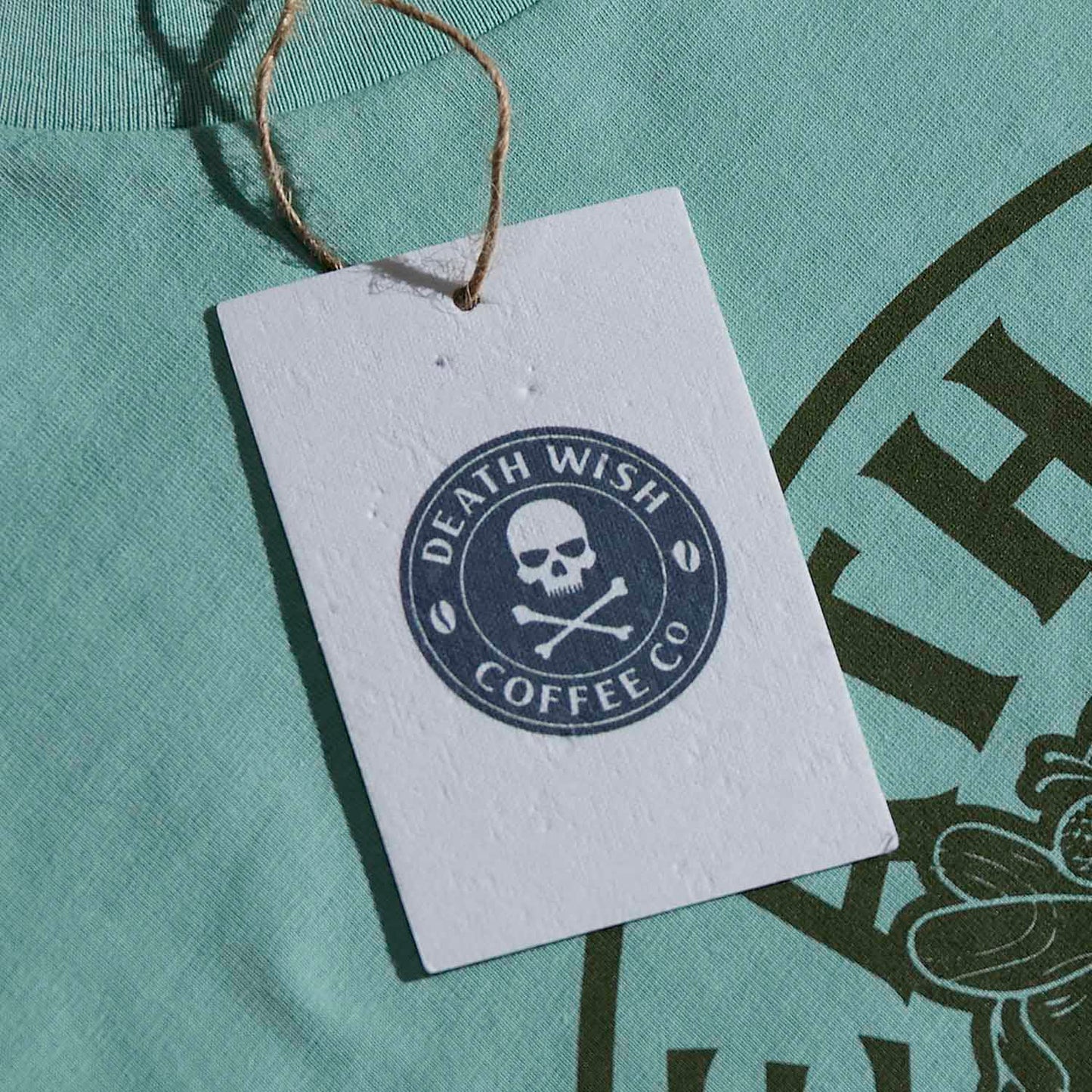 The lavender seed card included with the Death Wish Coffee Fatal Attraction Tee.