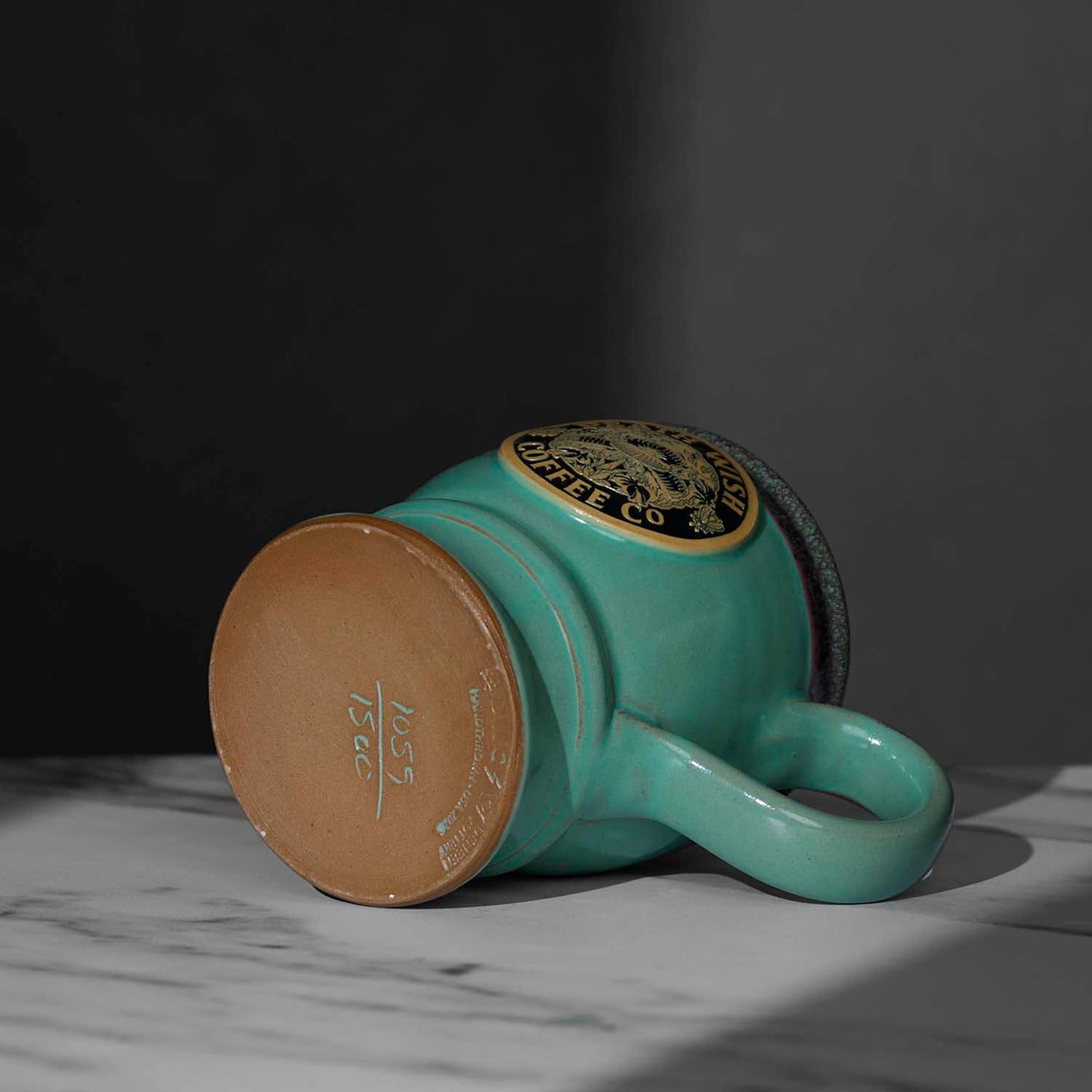 The bottom of the Death Wish Coffee Venus Fly Trap Mug.