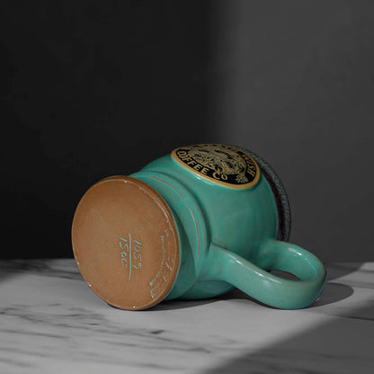 The bottom of the Death Wish Coffee Venus Fly Trap Mug.