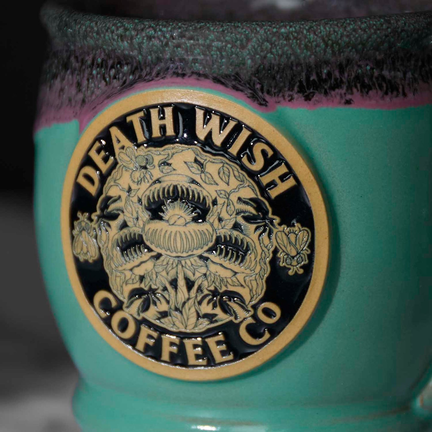 The medallion of the Death Wish Coffee Venus Fly Trap Mug.