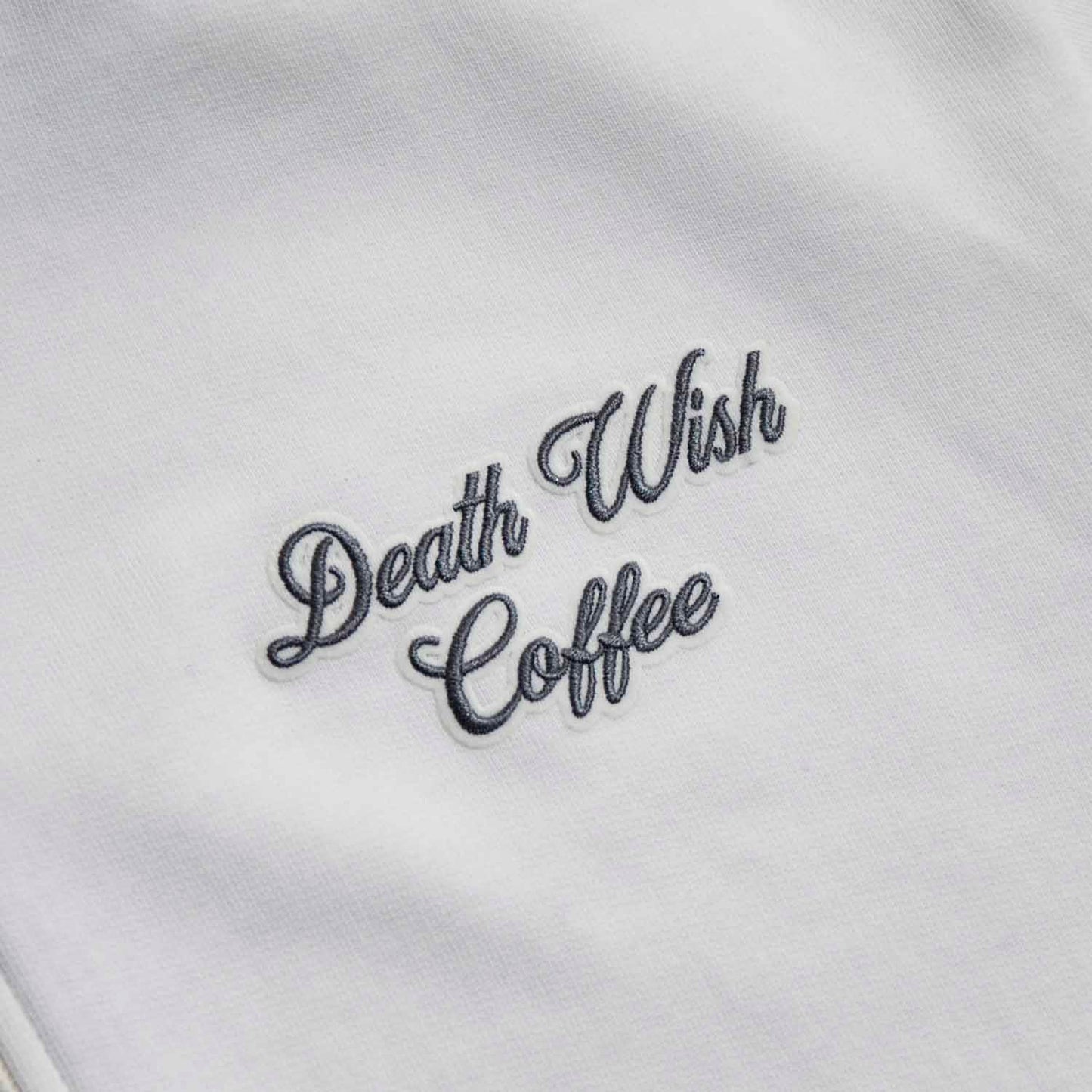 A detail shot of the front of the Death Wish Coffee After Hours Women's Full Zip Jacket.