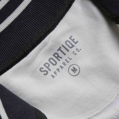 The inner neck label of the Death Wish Coffee After Hours Women's Full Zip Jacket.