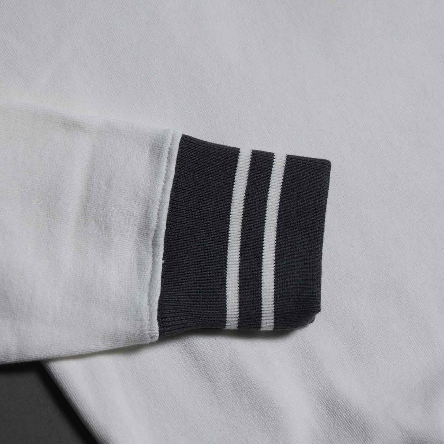 A detail shot of the cuff of the Death Wish Coffee Brews Cruise Pullover.
