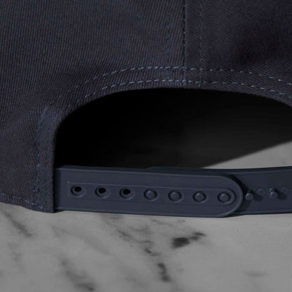 The snapback closure of the Death Wish Coffee Daily Directive Snapback.