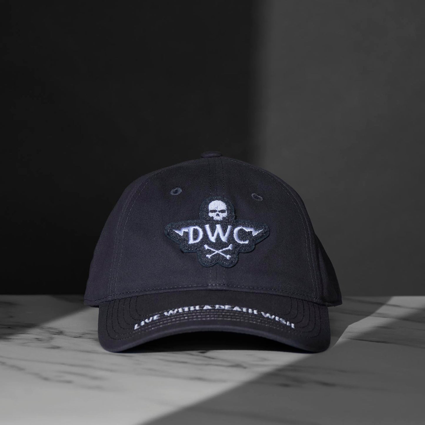 The front of the Death Wish Coffee Daily Directive Snapback.