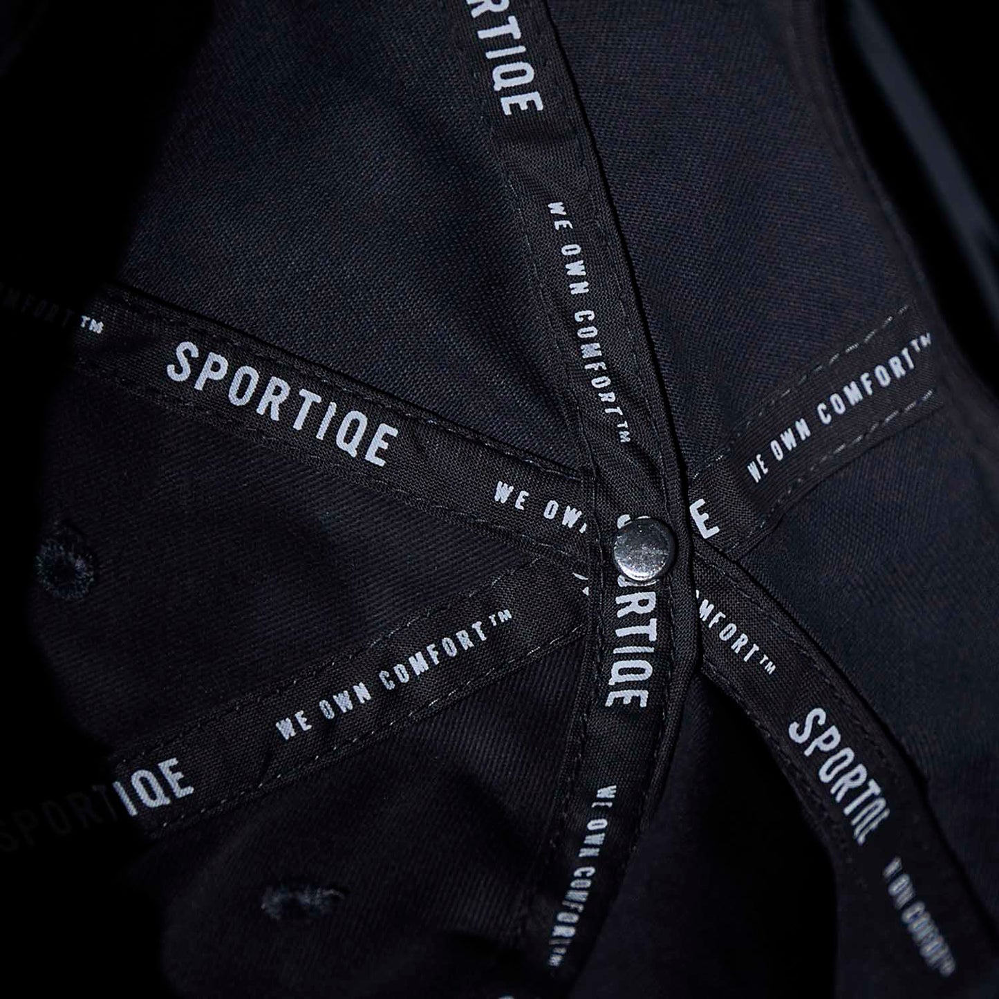 Interior taping of the Death Wish Coffee Daily Directive Snapback.