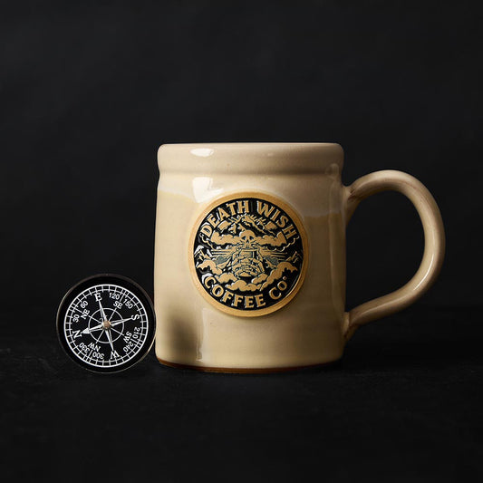 The Death Wish Coffee Shrouded Mountain Mug and Compass.