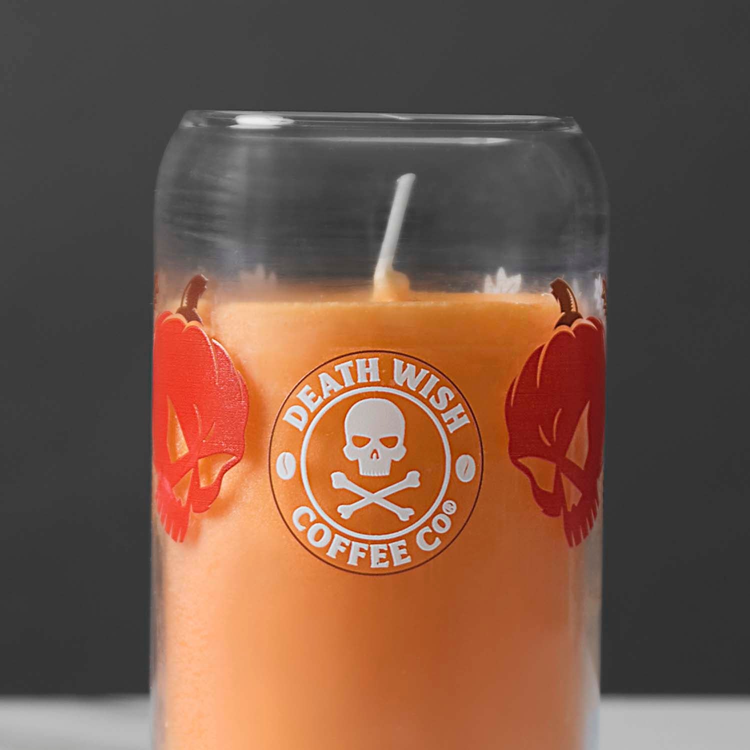 A detail shot of the front of the Death Wish Coffee Pumpkin Chai Soda Can Candle.