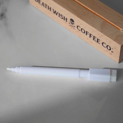 A detail shot of the Death Wish Coffee Caffeine Catalyst LED Dry Erase Board marker.