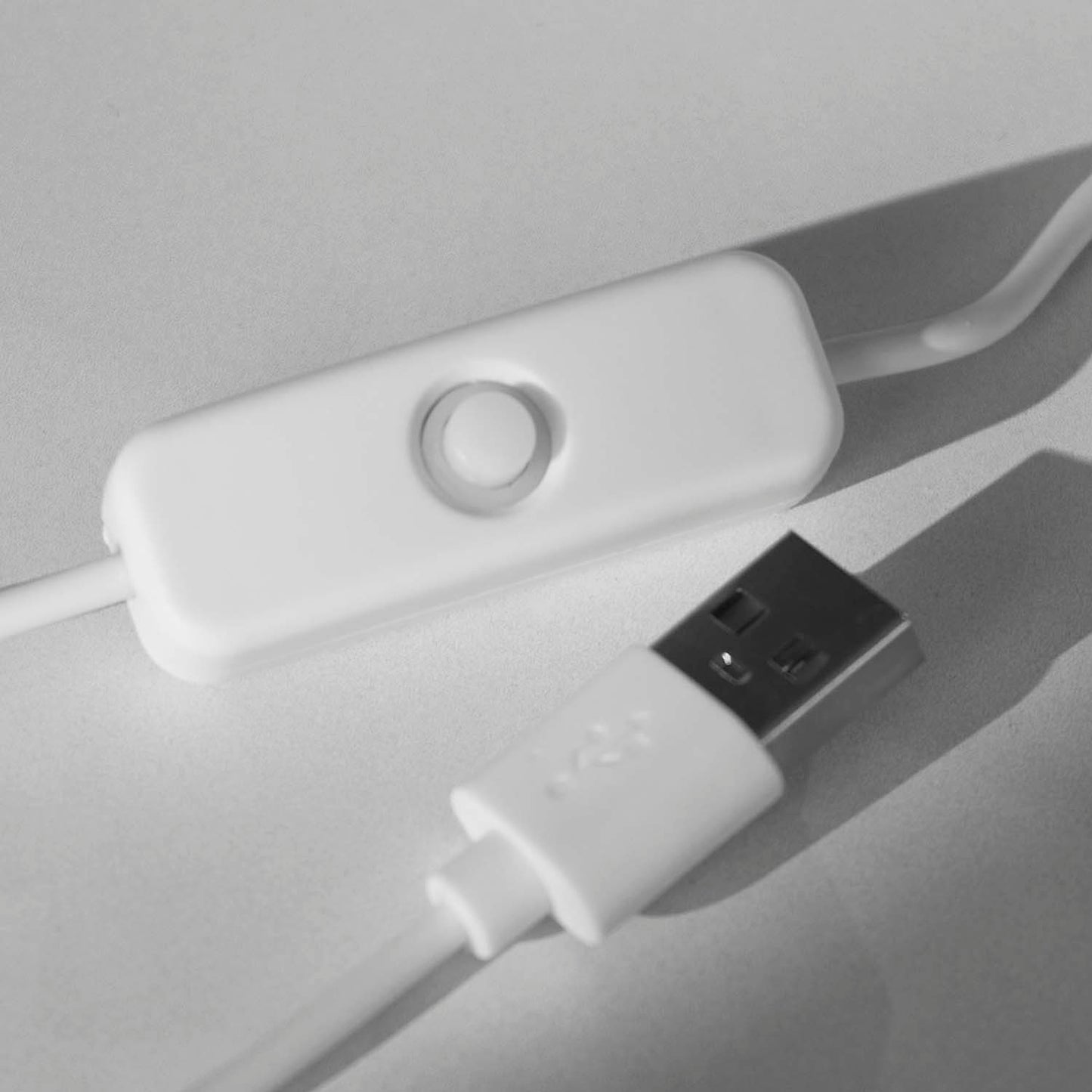 A detail shot of the Death Wish Coffee Caffeine Catalyst LED Dry Erase Board cord.