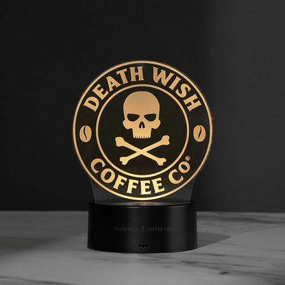 The Death Wish Coffee Neon Necromancer LED Light lit up using the skull and crossbones logo insert.
