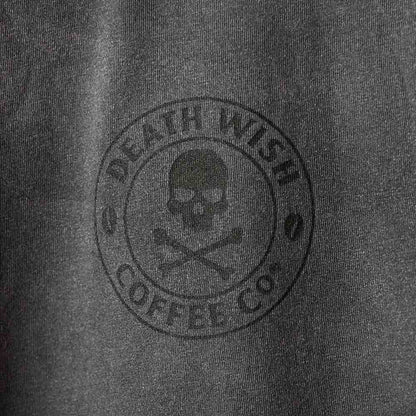 The chest logo of the Death Wish Coffee Dye Hard Tee.